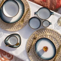 Filiżanka ze spodkiem DUKA TIME DIM 150 ml wielokolorowa porcelanowa